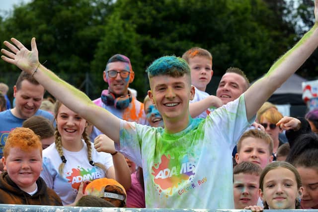 Adam B pictured with fans at his Charity Colour Run at the Templemore Sports Complex on Saturday afternoon last. Photograph: George Sweeney. DER2227GS – 009