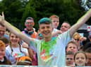 Adam B pictured with fans at his Charity Colour Run at the Templemore Sports Complex on Saturday afternoon last. Photograph: George Sweeney.  DER2227GS – 009