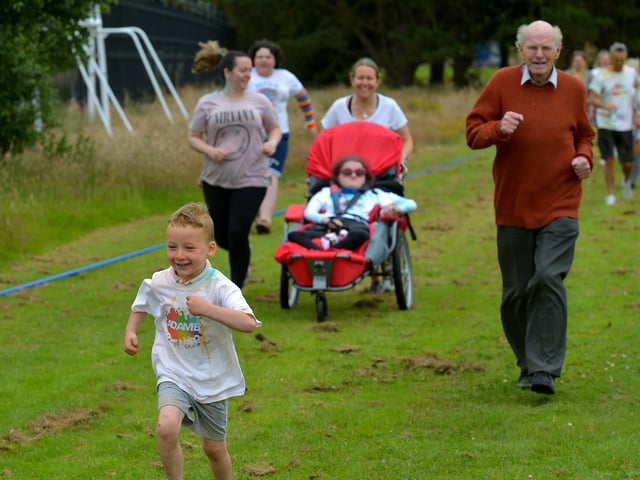 This young lad breaks away from the chasing pack at the Adam B Charity Colour Run at the Templemore Sports Complex on Saturday afternoon last. Photograph: George Sweeney.  DER2227GS – 022