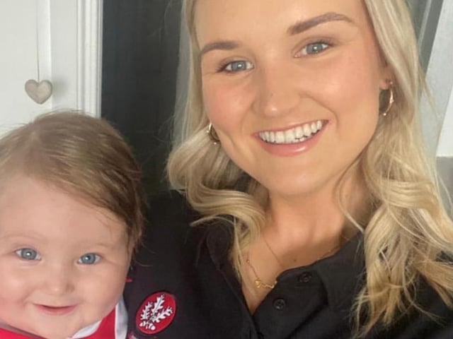 Derry fan Shannon Watson and her daughter are all smiles ahead of the match