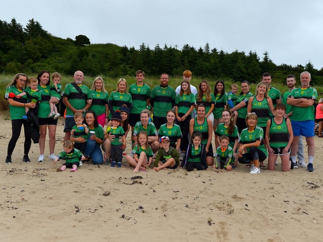 Members of the family circle of the late Aodhán ODonnell, a member of Na Magha hurling club, pictured at a joint fundraising event Cold Water Weekend with Waves for Mental Health held at Ludden Beach on Saturday and Sunday morning last. Funds were raised for Foyle Search and Rescue and Na Magha hurling club gym. Photograph: George Sweeney. DER2228GS 002