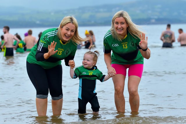 Young Kate McVeigh pictured with Denise ONeill and Maria Kelly at the joint fundraising event Cold Water Weekend in memory of Aodhán ODonnell with Waves for Mental Health held at Ludden Beach on Saturday and Sunday morning last. Photograph: George Sweeney.  DER2228GS  005