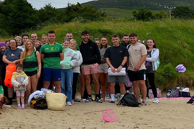 Members of the family circle and friends of the late Aodhán ODonnell, a member of Na Magha hurling club, pictured at a joint fundraising event Cold Water Weekend with Waves for Mental Health held at Ludden Beach on Saturday and Sunday morning last. Photograph: George Sweeney.  DER2228GS  003