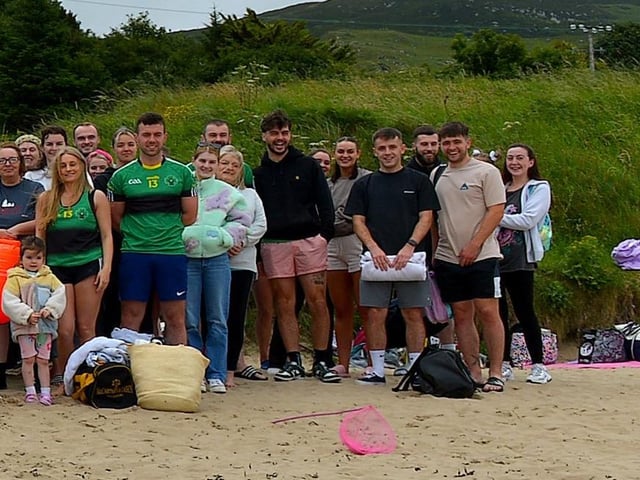 Members of the family circle and friends of the late Aodhán ODonnell, a member of Na Magha hurling club, pictured at a joint fundraising event Cold Water Weekend with Waves for Mental Health held at Ludden Beach on Saturday and Sunday morning last. Photograph: George Sweeney.  DER2228GS  003