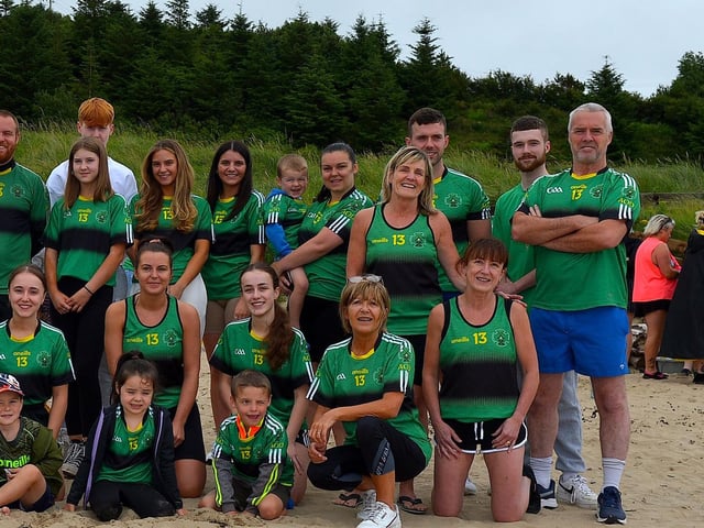 Members of the family circle of the late Aodhán ODonnell, a member of Na Magha hurling club, pictured at a joint fundraising event Cold Water Weekend with Waves for Mental Health held at Ludden Beach on Saturday and Sunday morning last. Funds were raised for Foyle Search and Rescue and Na Magha hurling club gym. Photograph: George Sweeney.  DER2228GS  002