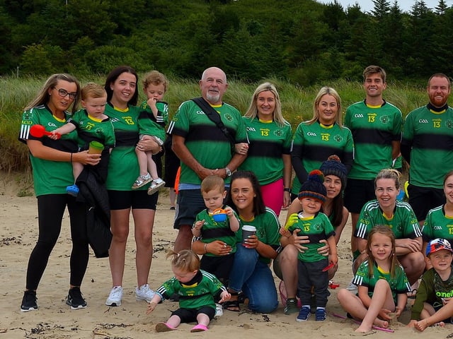 Members of the family circle of the late Aodhán ODonnell, a member of Na Magha hurling club, pictured at a joint fundraising event Cold Water Weekend with Waves for Mental Health held at Ludden Beach on Saturday and Sunday morning last. Funds were raised for Foyle Search and Rescue and Na Magha hurling club gym. Photograph: George Sweeney.  DER2228GS  002