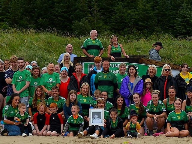 Members of the family circle and friends of the late Aodhán ODonnell, a member of Na Magha hurling club, pictured at a joint fundraising event Cold Water Weekend with Waves for Mental Health held at Ludden Beach on Saturday and Sunday morning last. Photograph: George Sweeney. DER2228GS 003