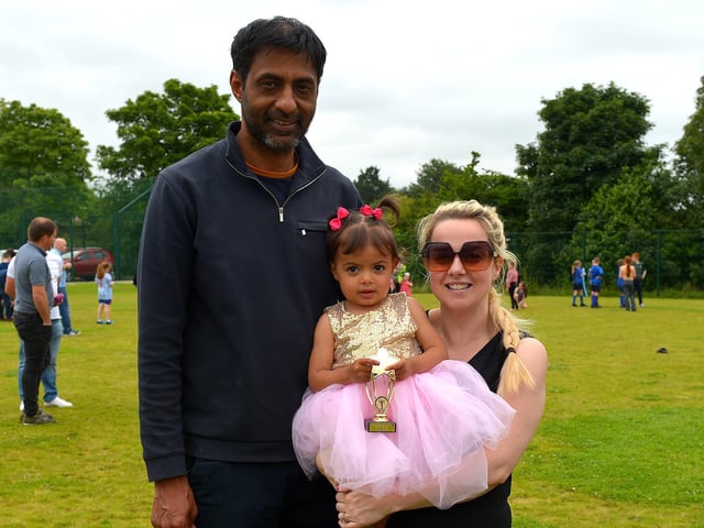 Esmee Chada, pictured with dad Sham and mum Theresa was a winner in the Bonny Baby 18-24 month’s old competition at the Muff Family Funday held on Sunday afternoon last. Photograph: George Sweeney. DER2228GS – 012