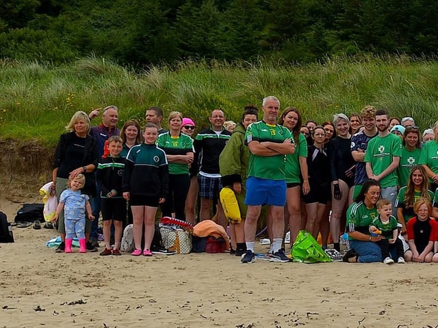 Members of the family circle and friends of the late Aodhán ODonnell, a member of Na Magha hurling club, pictured at a joint fundraising event Cold Water Weekend with Waves for Mental Health held at Ludden Beach on Saturday and Sunday morning last. Photograph: George Sweeney.  DER2228GS  003