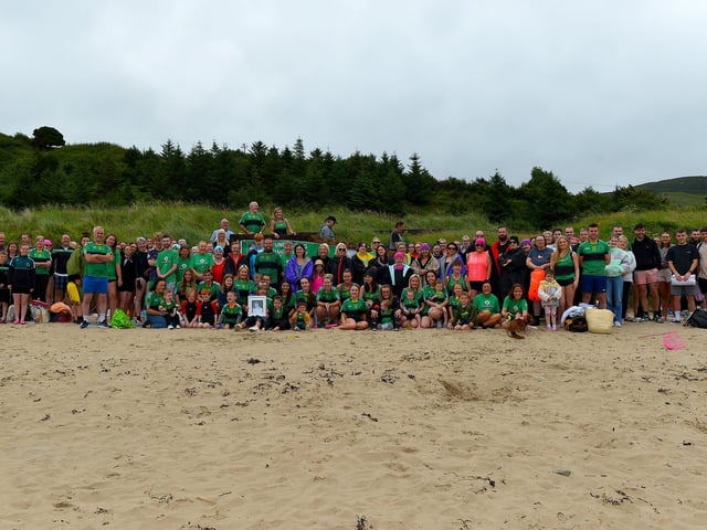 Members of the family circle and friends of the late Aodhán ODonnell, a member of Na Magha hurling club, pictured at a joint fundraising event Cold Water Weekend with Waves for Mental Health held at Ludden Beach on Saturday and Sunday morning last. Photograph: George Sweeney.  DER2228GS  003