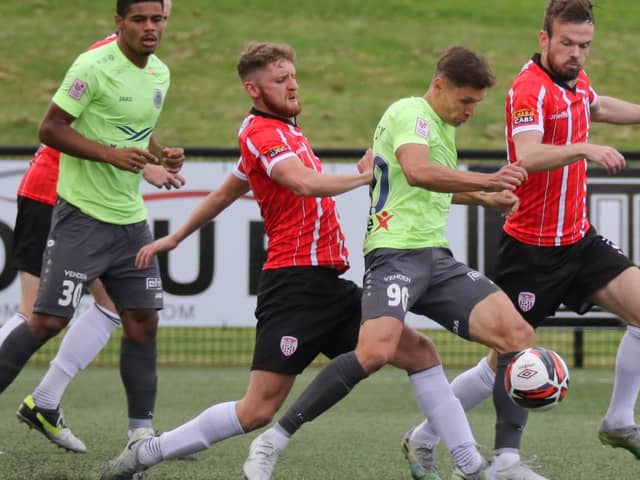 Derry City's Ronan Boyce and Cameron Dummigan try to close down Riga striker Oleksandr Filippov during the first leg at Brandywell. Photo by Joe Boland.