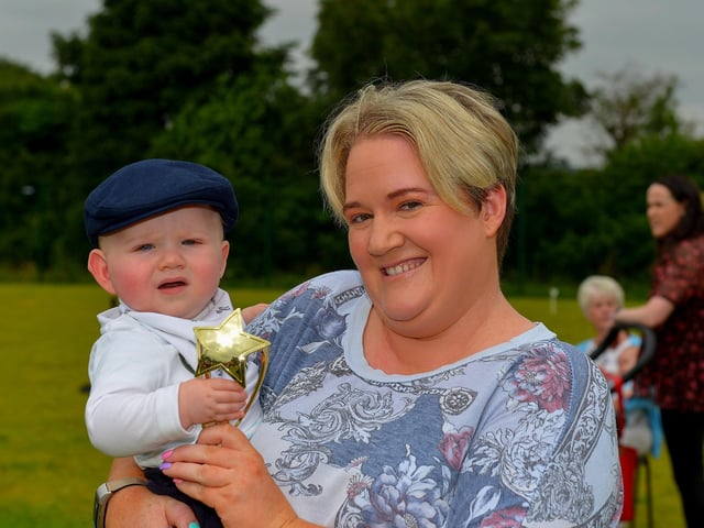 Ten months old Oisin Logue, pictured with Bronagh Breslin, was awarded first prize in the Bonny Baby 6-18 month’s old competition at the Muff Family Funday held on Sunday afternoon last. Photograph: George Sweeney. DER2228GS – 010