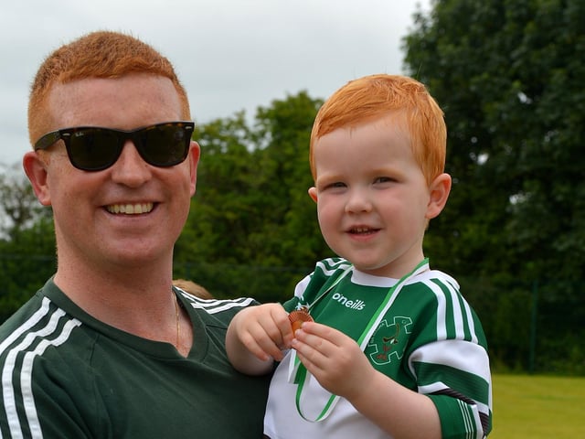 Odhran Power, pictured with dad Ryan, was a winner in the Bonny Baby 18 months to 3 years old competition at the Muff Family Funday held on Sunday afternoon last. Photograph: George Sweeney. DER2228GS – 013