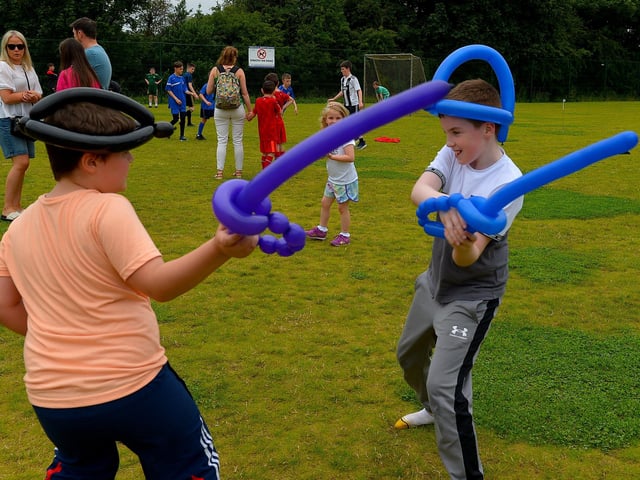 Neill and Danny practice their fencing skills at the Muff Family Funday held on Sunday afternoon last. Photograph: George Sweeney. DER2228GS – 022