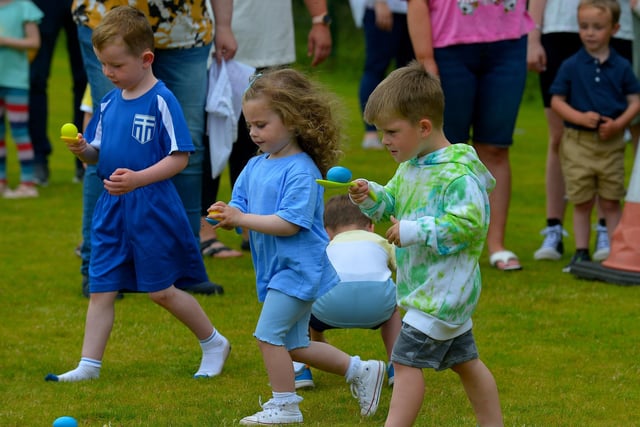 Serious concentration during the children’s egg and spoon race at the Muff Family Funday held on Sunday afternoon last. Photograph: George Sweeney.  DER2228GS – 030