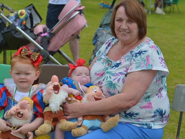Cousins Mia McMenamin, aged 2, and Farah Kerrigan (3months) pictured with their granny Tina at the Muff Family Funday held on Sunday afternoon last. Photograph: George Sweeney. DER2228GS – 018
