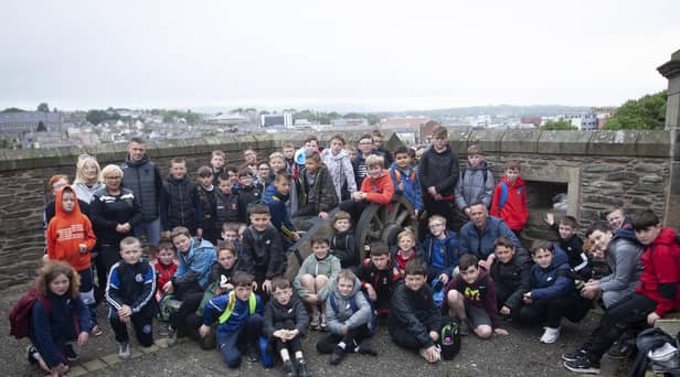 The St. Josephâ€TMs Boys School Summer Scheme pictured at the Walkerâ€TMs Pillar monument on the Cityâ€TMs Walls on Wednesday.