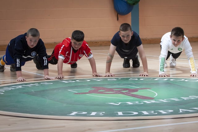 Press-ups no problem to these four young athletes, captured during last weekâ€TMs Summer Scheme at St. Josephâ€TMs.