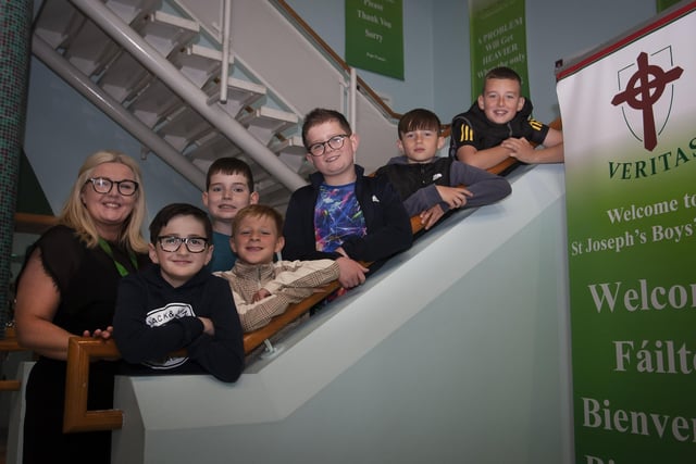 Mrs. Ciara Deane, St. Josephâ€TMs Boys School pictured during last weekâ€TMs Summer Scheme with some of the Waterside boys who will be joining the school in September.