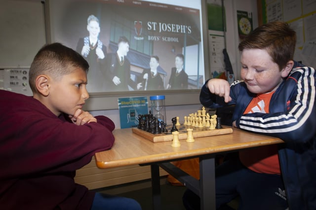 Time out for a game of chess for these two during last weekâ€TMs summer scheme. (Photos: Jim McCafferty Photography)