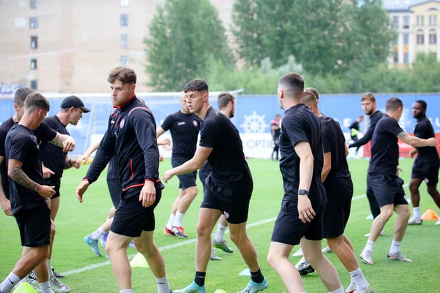 Derry City's Cameron McJannet and Eoin Toal warming up with the rest of the squad ahead of tomorrow night's Europa Conference League game against Riga. Picture by Kevin Moore/MCI