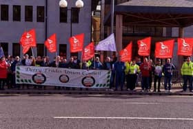 Unite members at a previous strike at the council offices.