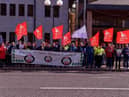 Unite members at a previous strike at the council offices.