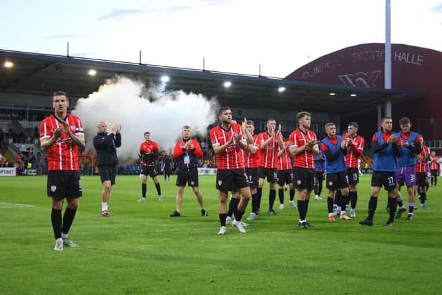 Will Patching leads the Derry City players towards the travelling fans in Riga after the Candy Stripes' defeat in Europe. Photo by Kevin Moore.