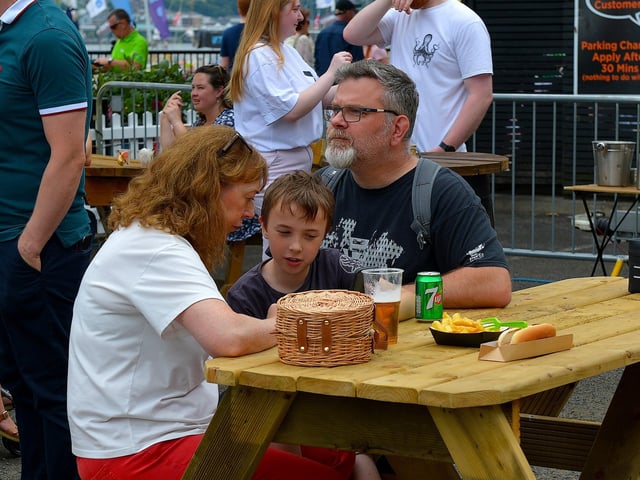 Relaxing and enjoying food from local vendors during the Legenderry Street Food Festival held along the Foyle Embankment over the weekend. Photo: George Sweeney. DER2228GS – 039