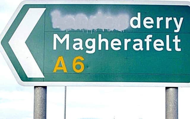 Road signs to Derry are often vandalised.
