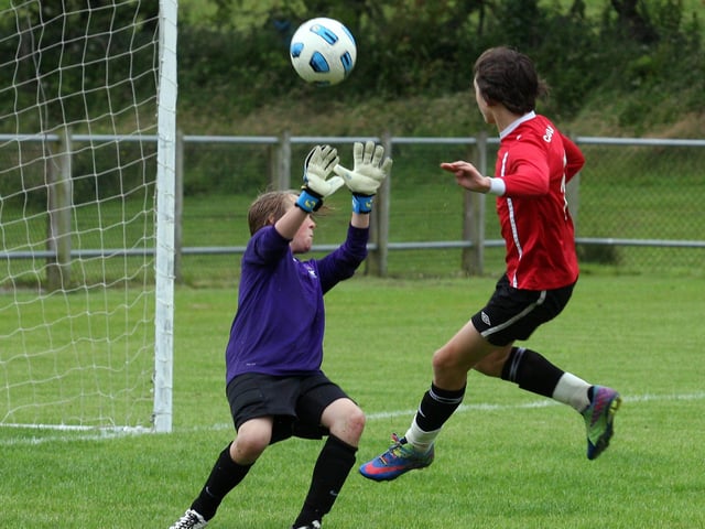 Stonebridge goalkeeper Harrison Ashe, defends his net from the Maiden City Academy attack in their Foyle cup under 13 game at Newbuildings. INLS 1230-520MT.
