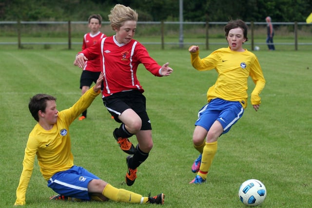 Maiden City Academy’s Michael Brown, breaking through the Stonebridge defence during action in their Foyle cup under 13 game at Newbuildings.  INLS 1230-522MT.
