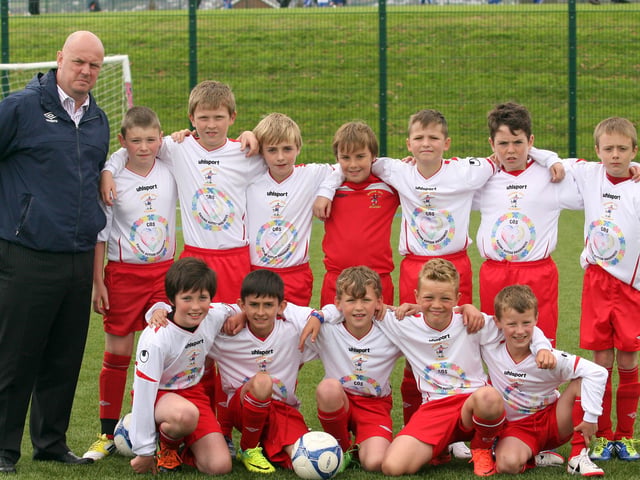 Maiden City Academy under 10 team, with their new football kit, and their sponsor Paul Kee. INLS 1230-513MT.