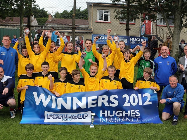 ©/Lorcan Doherty Photography - July 21th 2012.
Hughes Insurance Foyle Cup U-14 Plate Final. Maiden City Academy V Dungoyne (Belfast). Maiden City Academy celebrate winning the Hughes Insurance Foyle Cup U-14 Plate final Included is Brian McDowell, Head of Sales and Marketing at Hughes Insurance.
Photo Credit Lorcan Doherty Photography