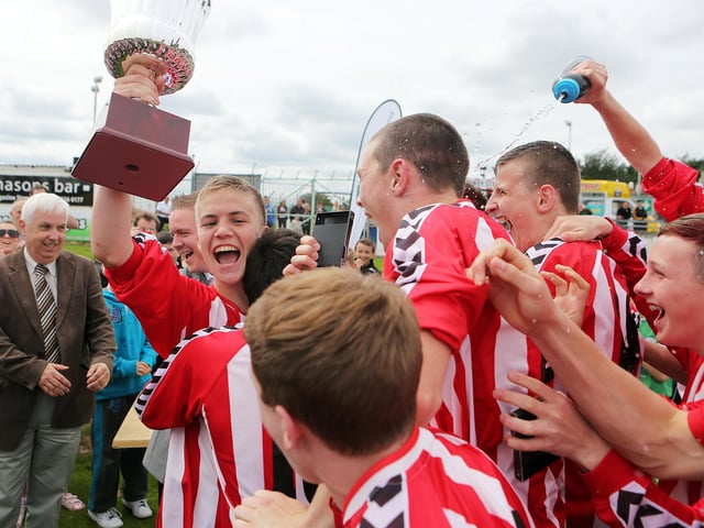 ©/Lorcan Doherty Photography - July 20th 2012.
Hughes Insurance Foyle Cup U-16 Cup Final. Derry & District Youth FA v Inishowen Youth League. Derry players celebrate following the trophy presentation.
Photo Credit Lorcan Doherty Photography