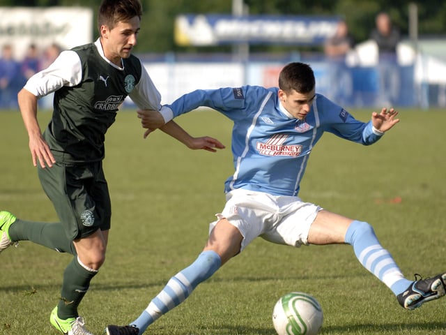 Ballymena United striker Jamie Davidson battles for possession during their Foyle Cup Under-19's final against Hibernian on Friday night. 2407JM03