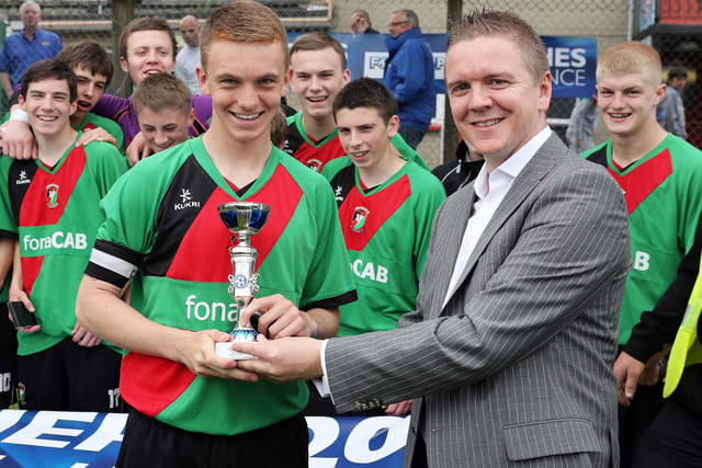 ©/Lorcan Doherty Photography -  July 20th 2012. 

Hughes Insurance Foyle Cup U-16 Pate Final. Glentoran V Strabane Athletic. 

Brian McDowell, Head of Sales and Marketing at Hughes Insurance, presenting the Hughes Insurance U-16 Foyle Plate to Ryan Cochrane, captain, Glentoran, who defeated Strabane Athletic in the final. Brian McDowell of Hughes Insurance stated: “The Hughes Insurance Foyle Cup is a tournament Derry can be proud of.  Hughes Insurance is incredibly proud to be associated with a prestigious tournament that is clearly the premier youth competition in Europe.  Everyone involved with the Foyle Cup – from the organisers to the participating teams should take credit for what has been a truly world class football tournament.”

Photo Credit Lorcan Doherty Photography
