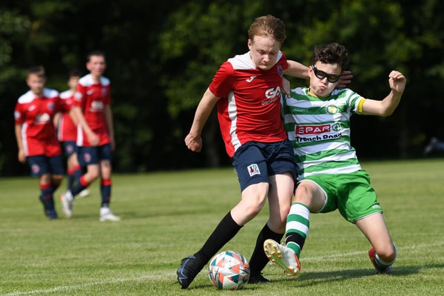 A great sliding tackle from a Top of the Hill Celtic defender during Monday's game against Clooney in the O'Neills Foyle Cup U13 section. Picture by Jim McCafferty