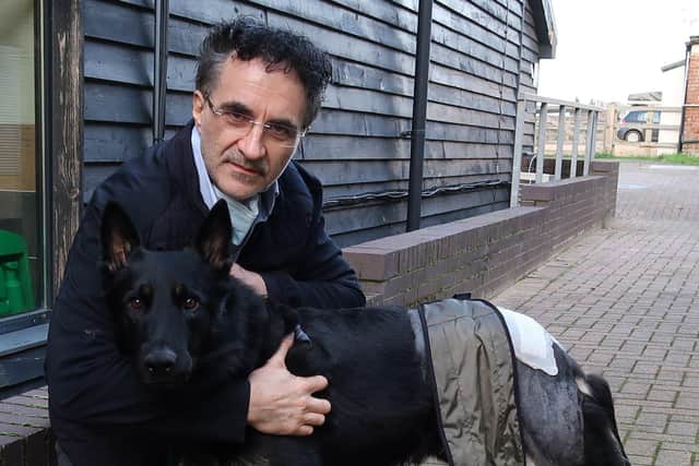 Noel with Trigger who arrives with Met Police dog handler Rob