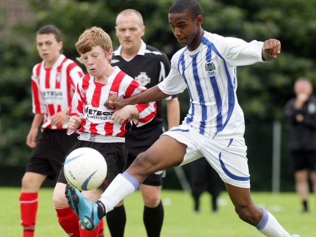 ©/Presseye.com - 24th July 2010. Press Eye Ltd - Northern Ireland. Foyle Cup 2010. U-14 Plate Final. Derry and District Youth League V Aspire Academy, Qatar. Derry's Paddy Slevin and Aspire's Husam Kamal Hassan Hassanin.
Mandatory Credit Photo Lorcan Doherty / Presseye.com