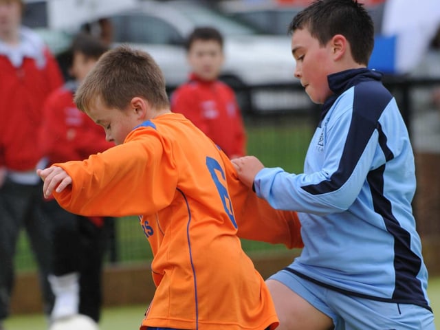 Mulroy Academy player Mark mcAteer pictured in action against Derry & District in the Under 10 years Foyle Cup competition. Mark was outstandiing at centre forward for his team who fwere winners of the 3 and 4th place playoff game at the tournament. (photo paddy Gallagher).