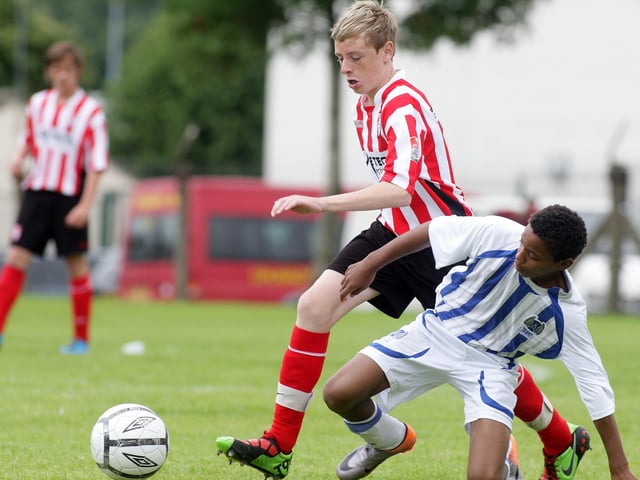 ©/Presseye.com - 24th July 2010. Press Eye Ltd - Northern Ireland. Foyle Cup 2010. U-14 Plate Final. Derry and District Youth League V Aspire Academy, Qatar. D&D's Luke McCloskey and Aspire's Salem Ali S Al Hajri.
Mandatory Credit Photo Lorcan Doherty / Presseye.com