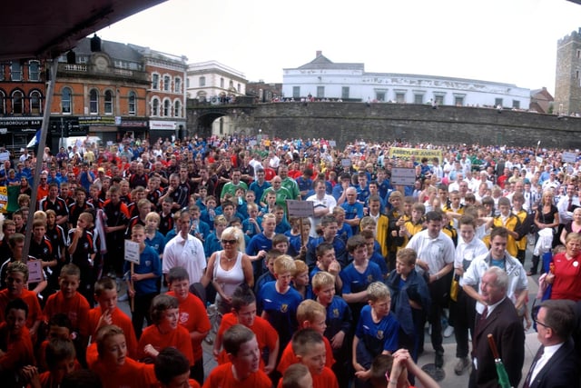 The Thousands of footballers packed into Guildhall Square for the opening parade fo the Foyle CUp. (2107SL07) Photo: Stephen Latimer