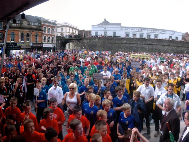 The Thousands of footballers packed into Guildhall Square for the opening parade fo the Foyle CUp. (2107SL07) Photo: Stephen Latimer