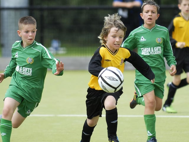 Michael McConnell sets off on an attacking run for Limavady United under-10's during their Foyle Cup match against Shankill Youth. LS30-195KM10