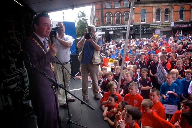 The Mayor of Derry, Councillor, Colum Eastwood, addresses the thousands of children in Guildhall Square for the Foyle Cup. (2107SL09)