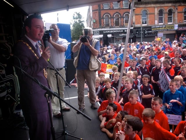 The Mayor of Derry, Councillor, Colum Eastwood, addresses the thousands of children in Guildhall Square for the Foyle Cup. (2107SL09)