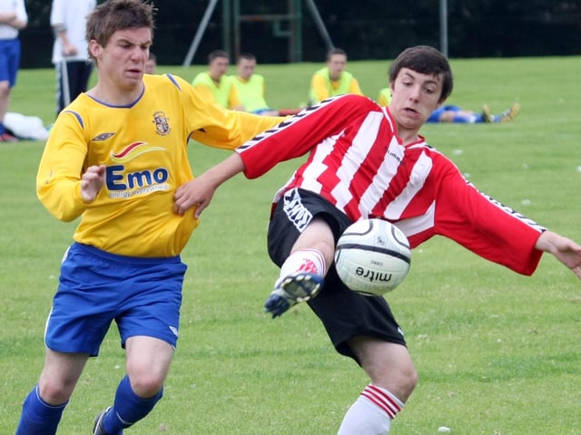 Aaron Logan, brings the ball under control for Derry & District Youth against Newhill , in the U14 Plater Final at the Brandywell Showgrounds, in the Foyle Cup 2010.  2407GM03