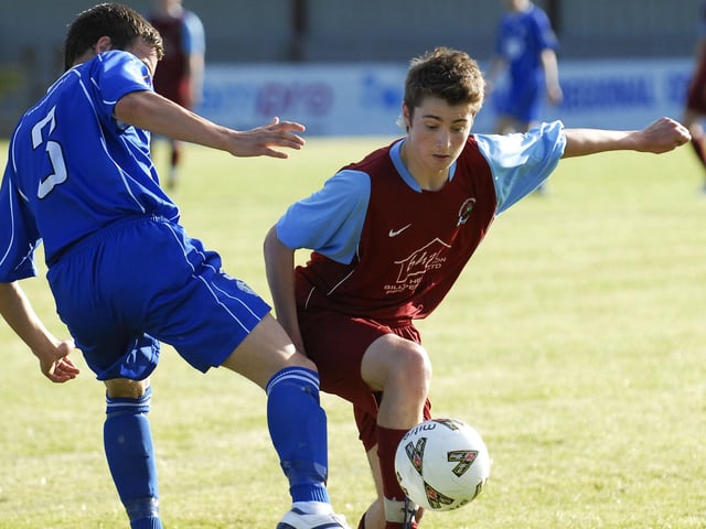 Institute under-19's player Matty Smyth skips past this challenge from Finn Harps defender Aiden Friel during their Foyle Cup match at the Riverside Stadium. LS30-183KM10