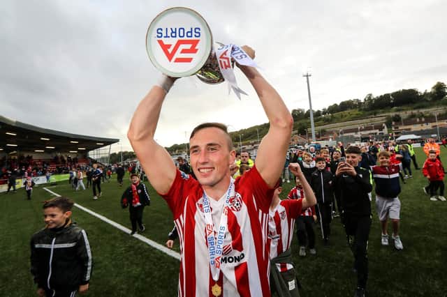 Aaron McEneff holds aloft the EA Sports Cup trophy after their victory over Cobh Ramblers at a packed out Brandywell, in 2018. He is one of a few Derry men who have won the League of Ireland Premier Division title, FAI Cup and League Cup during his career. Picture by Ryan Byrne/INPHO